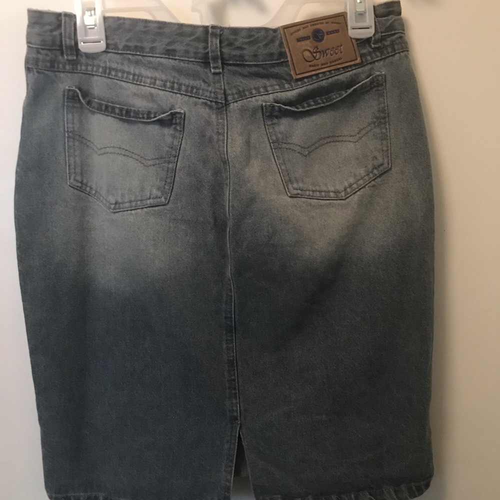 Sweet faded blue Jean skirt size. Size is medium.